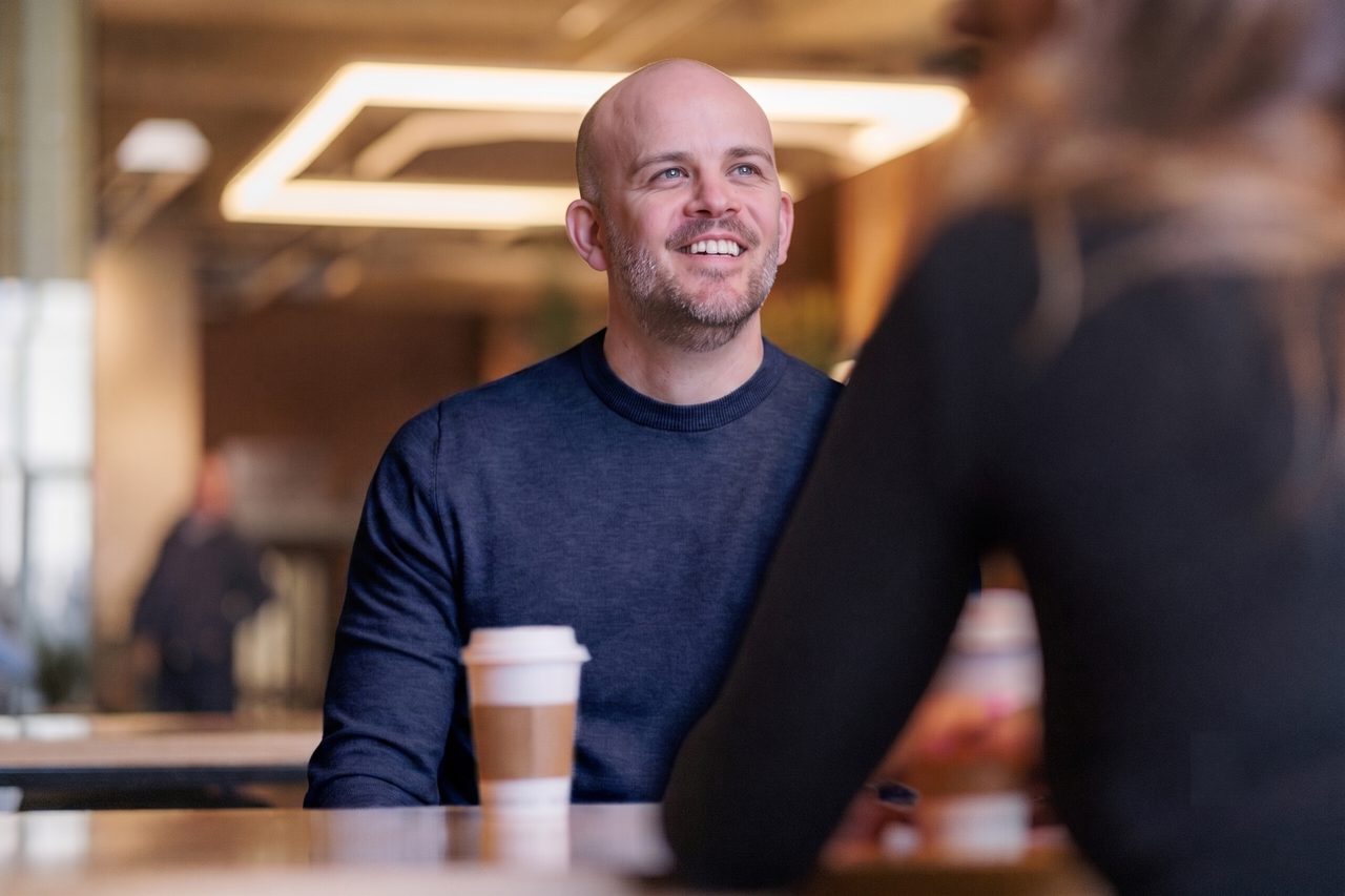 Ian Cockram meeting a client over coffee to talk through their SEO audit